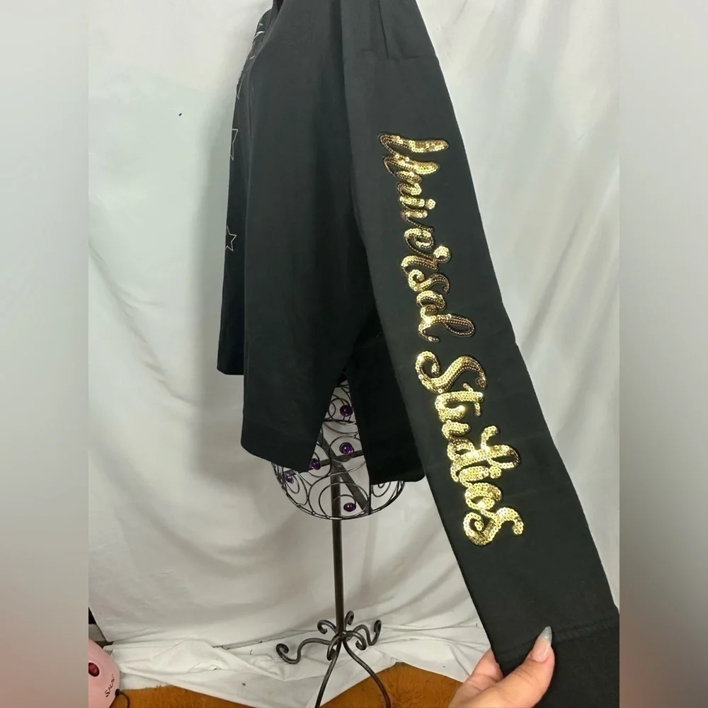 Universal Studios gold sequin stars black sweater size XL